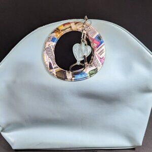 Vintage Jeannie Lottie Pastel Blue with Newsprint